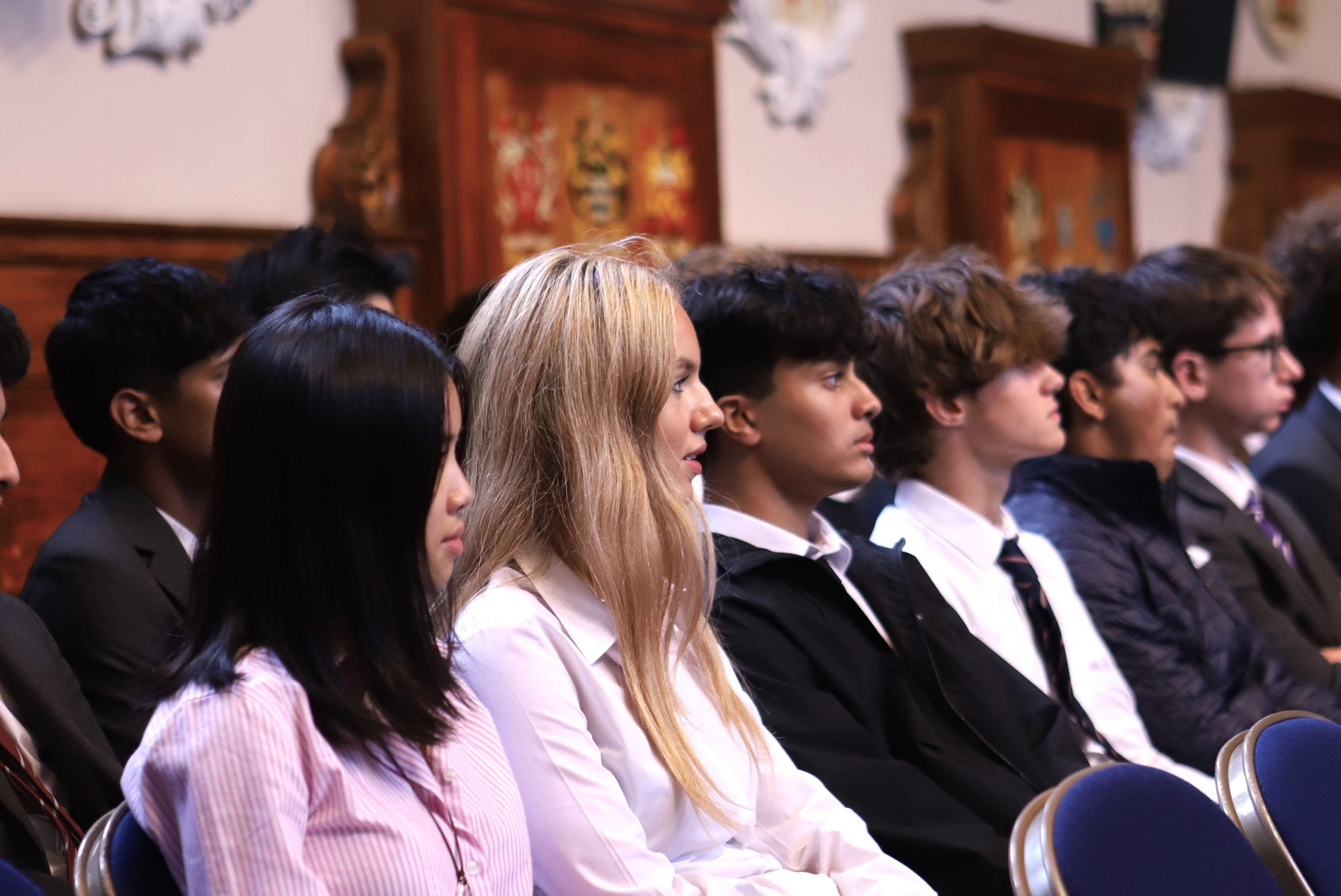 Sixth Form Girls and boys in a row in the audience at Bijan Omrani's talk on his new book 'God is an Englishman' at Westminster School.