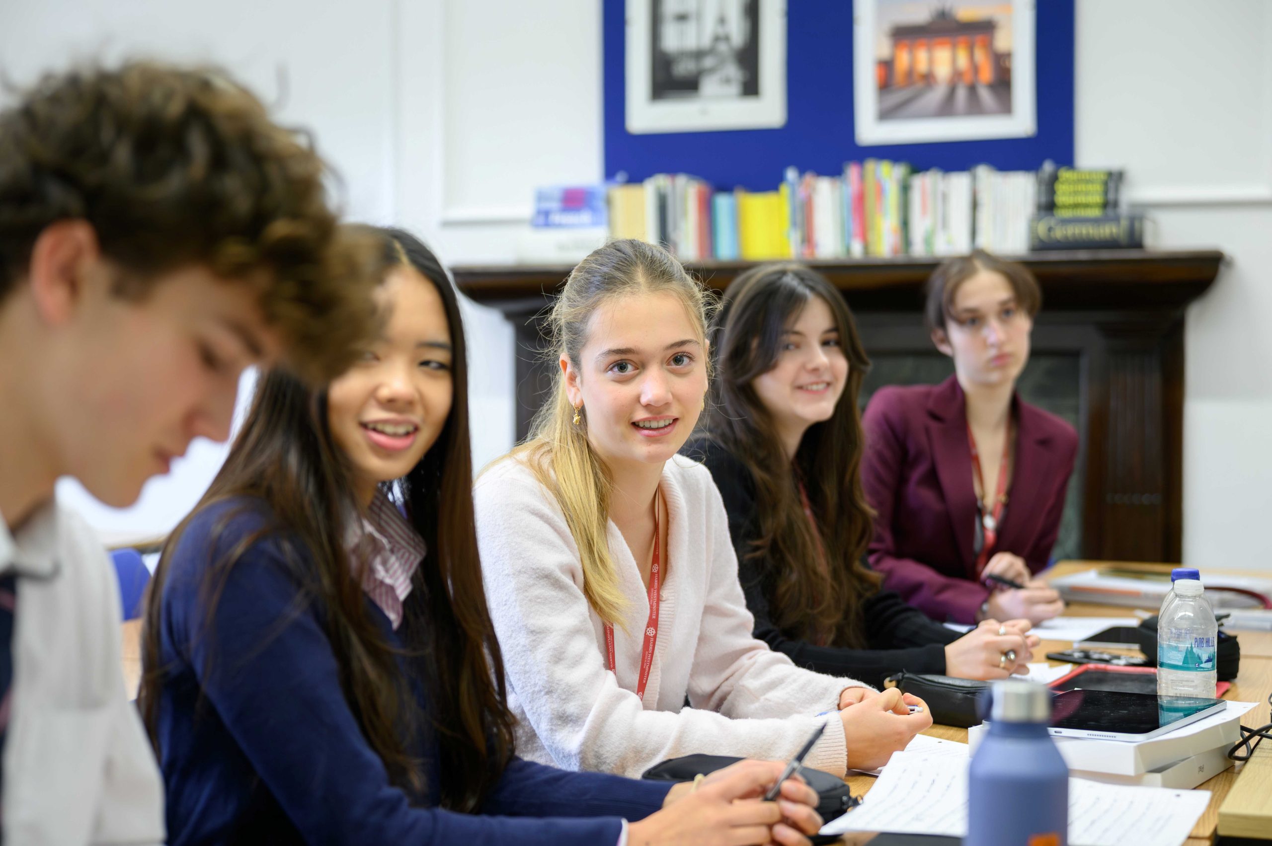 Three female Harris Westminster pupils in a German class at Westminster, looking towards the camera