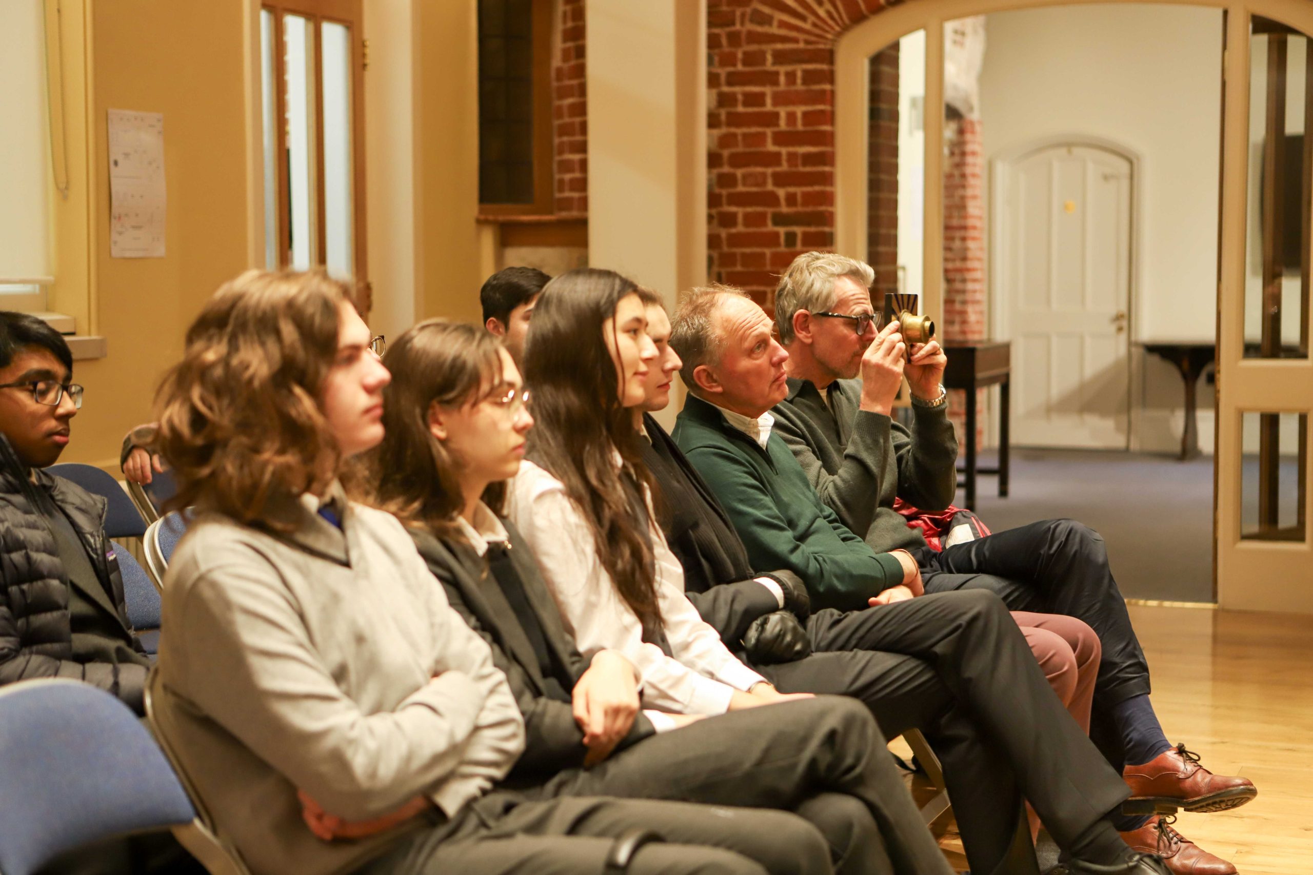 A front row of pupils and staff members