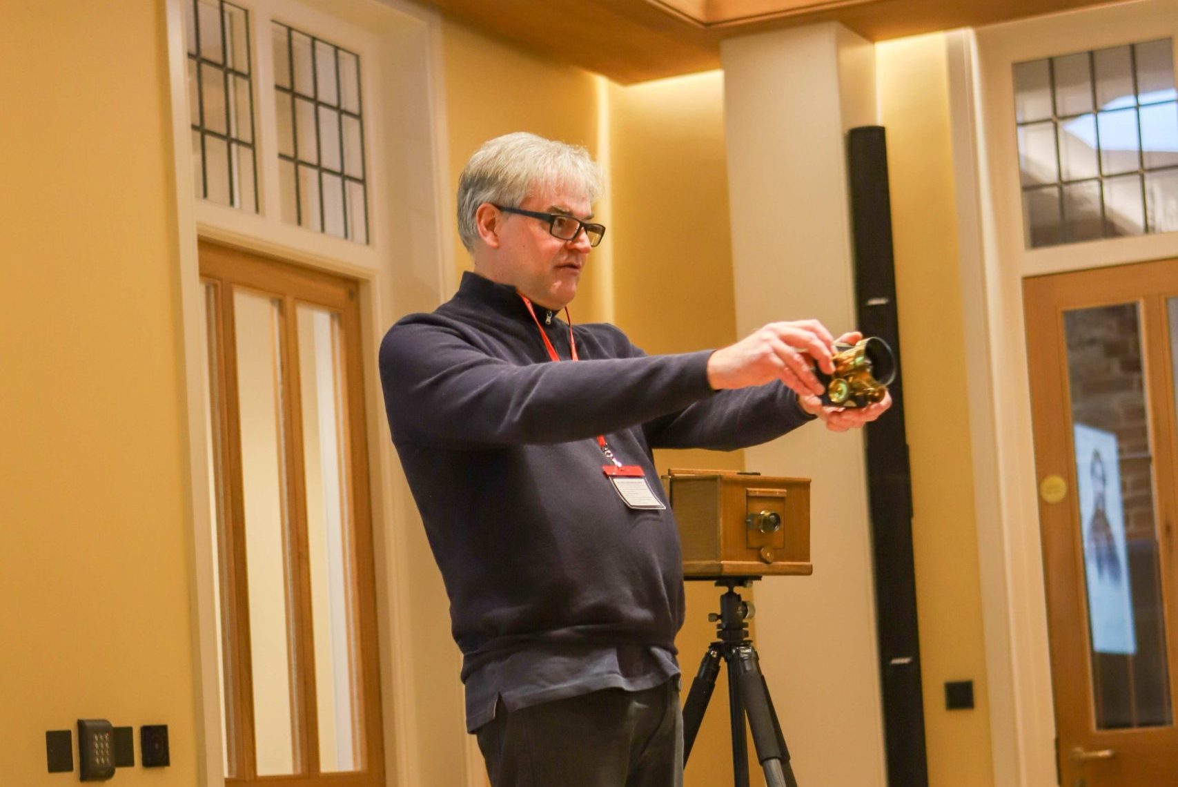 Pete Swann showing the group the antique box camera