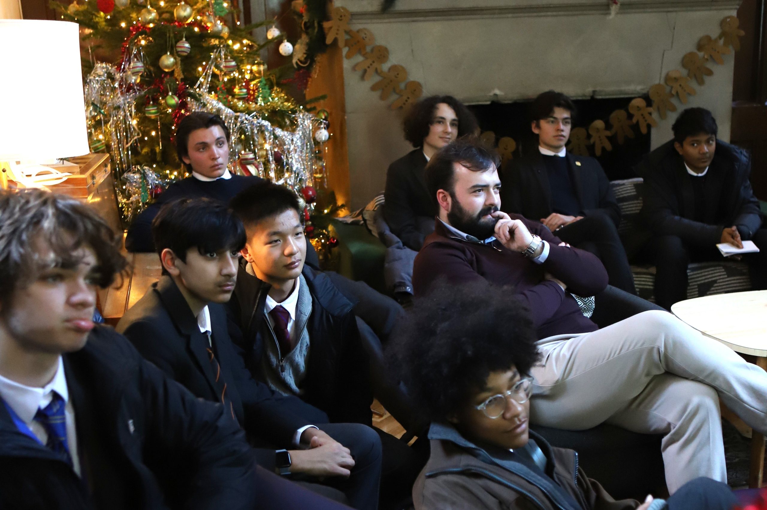 Pupils and staff sat down informally watching the talk