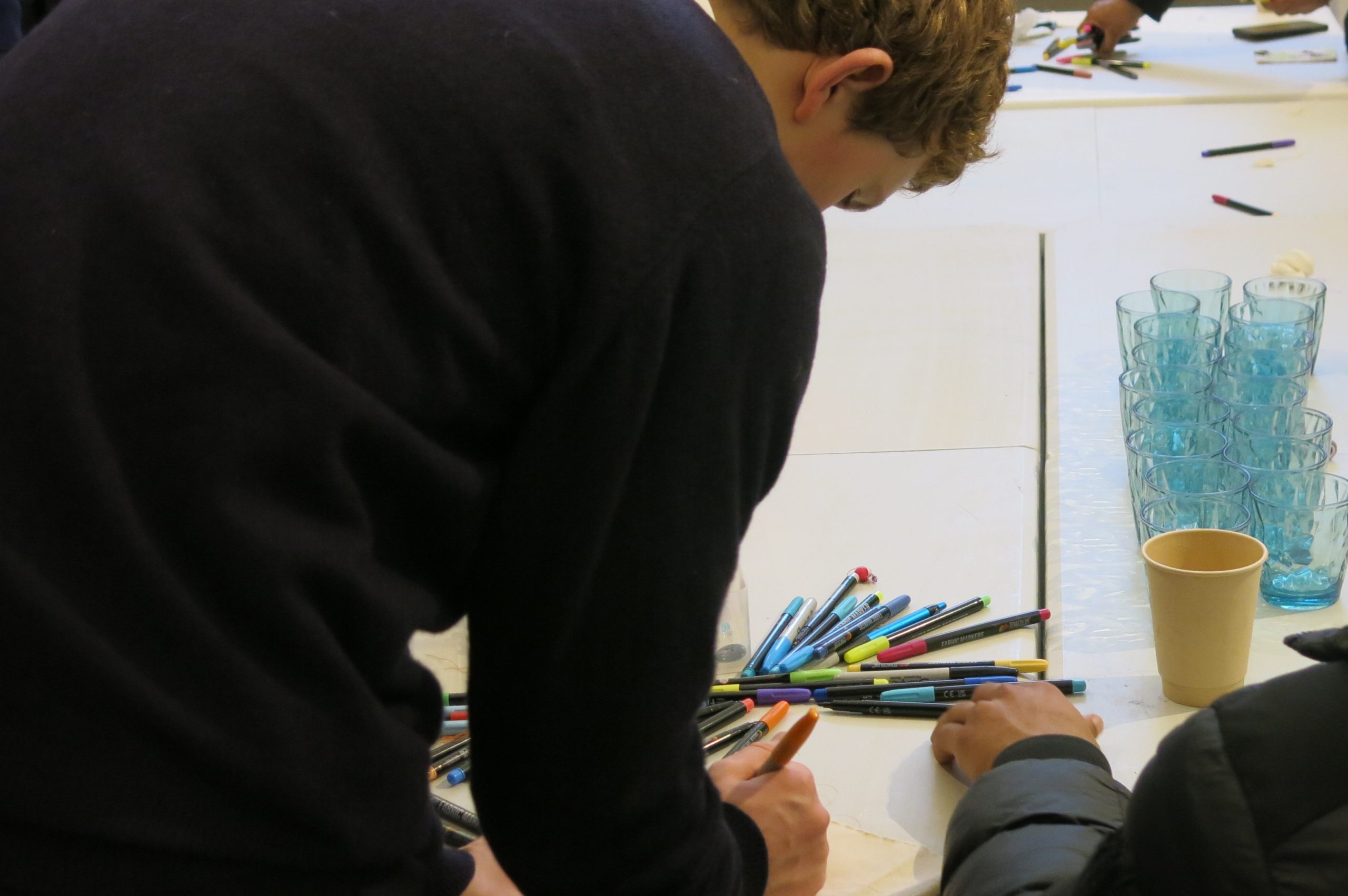 George drawing with a participant