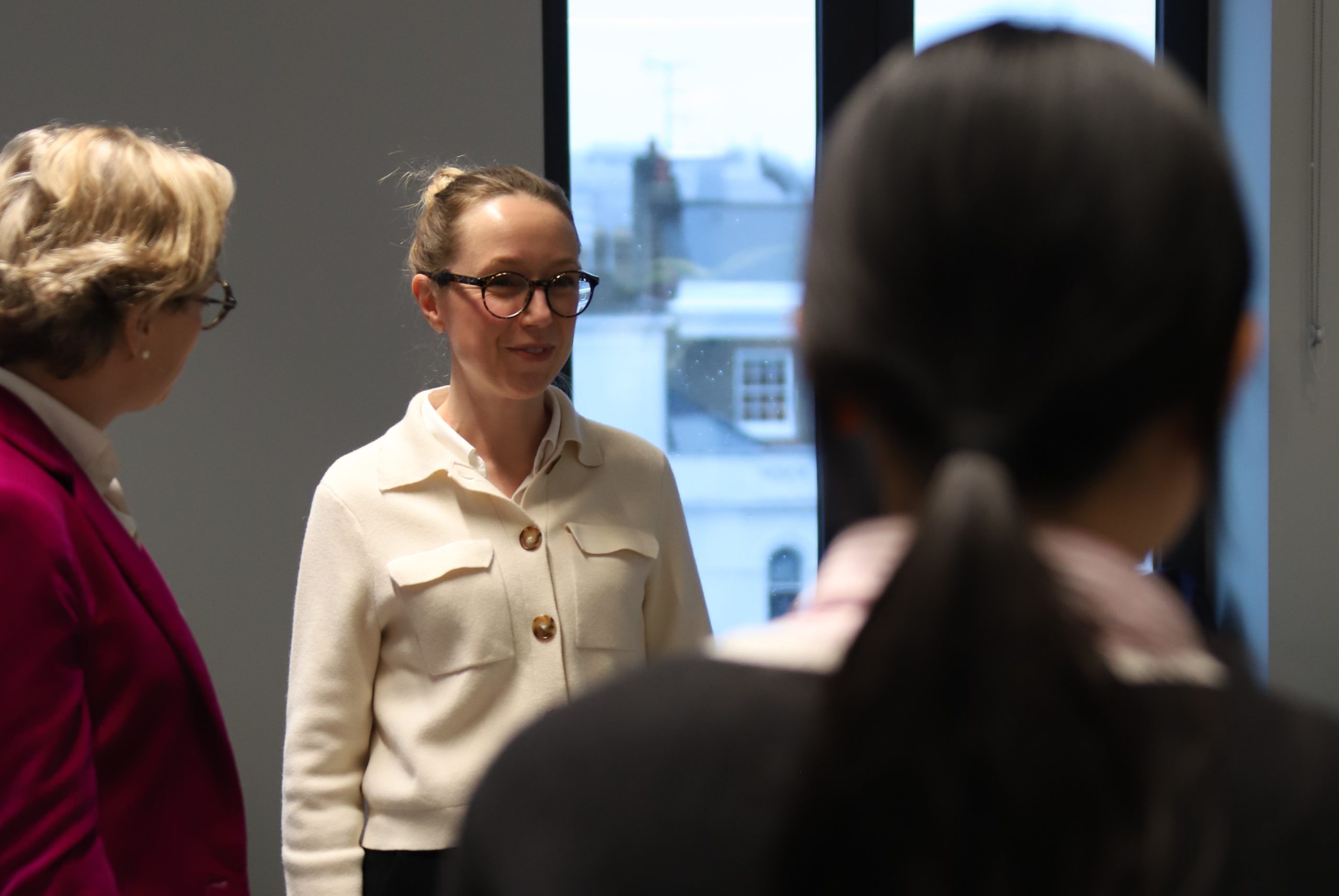 Meeting another female employee on the floor